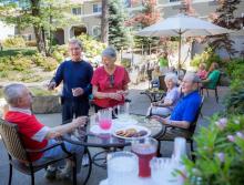 Residents socializing on the patio.