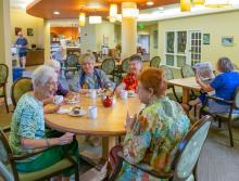 A group of women socializing at the community Bistro